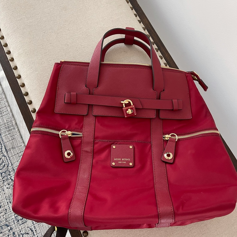 Henri Bendel red backpack used with love